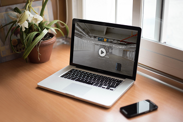 Tour Virtual de una Propiedad Comercial - Mostrado en una Computadora Portátil